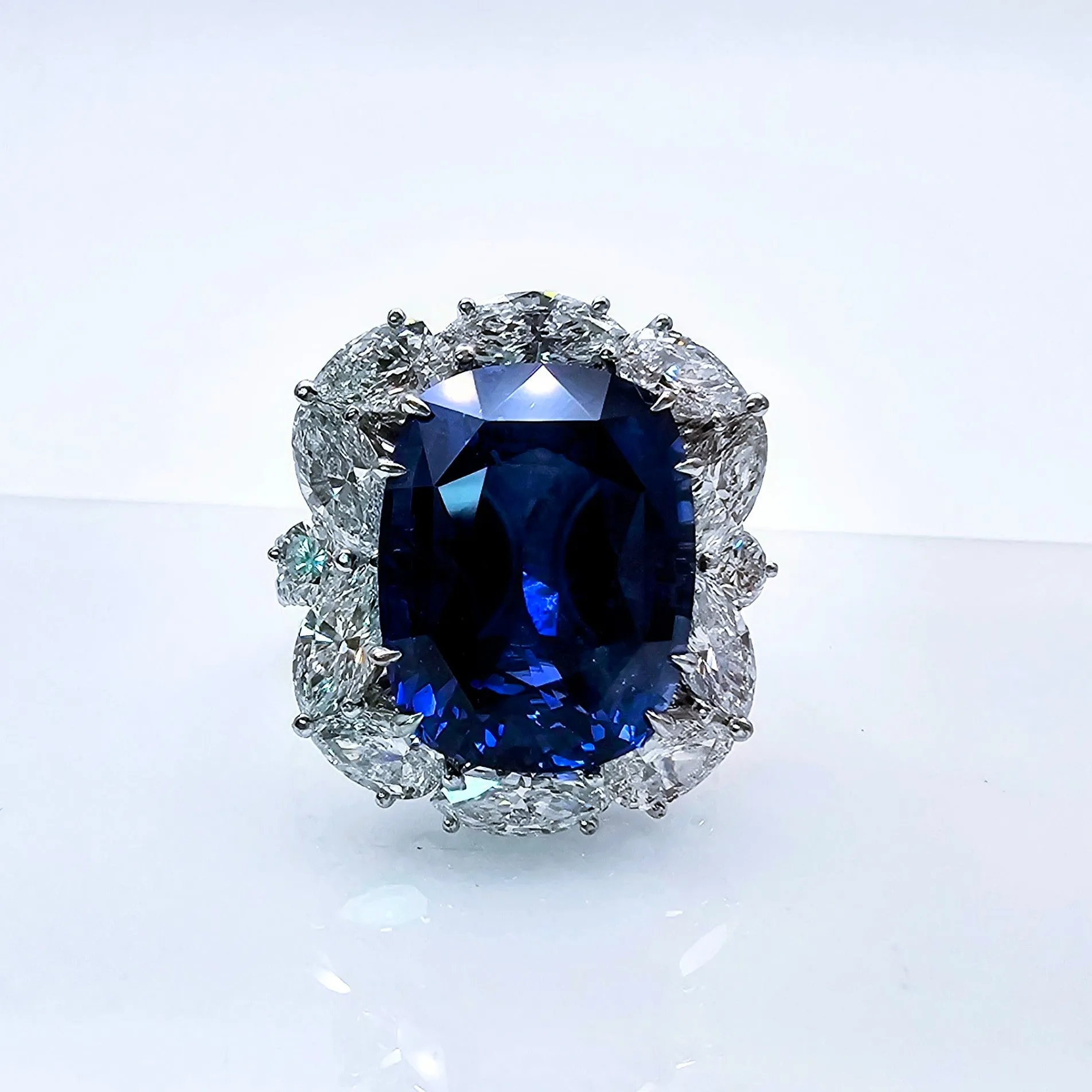 Blue Sapphire diamond ring set in 18k white gold